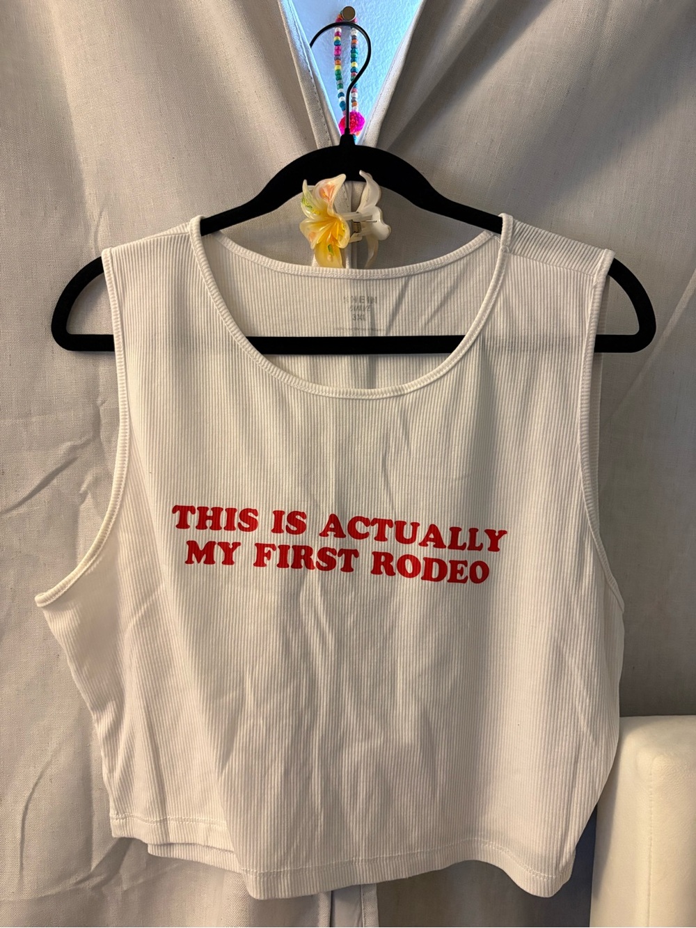 White Ribbed Crop Tank with Red 'This Is Actually My First Rodeo'